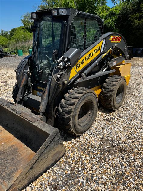 l228 skid steer loader with bale grapple|used new holland l228 skid steer.